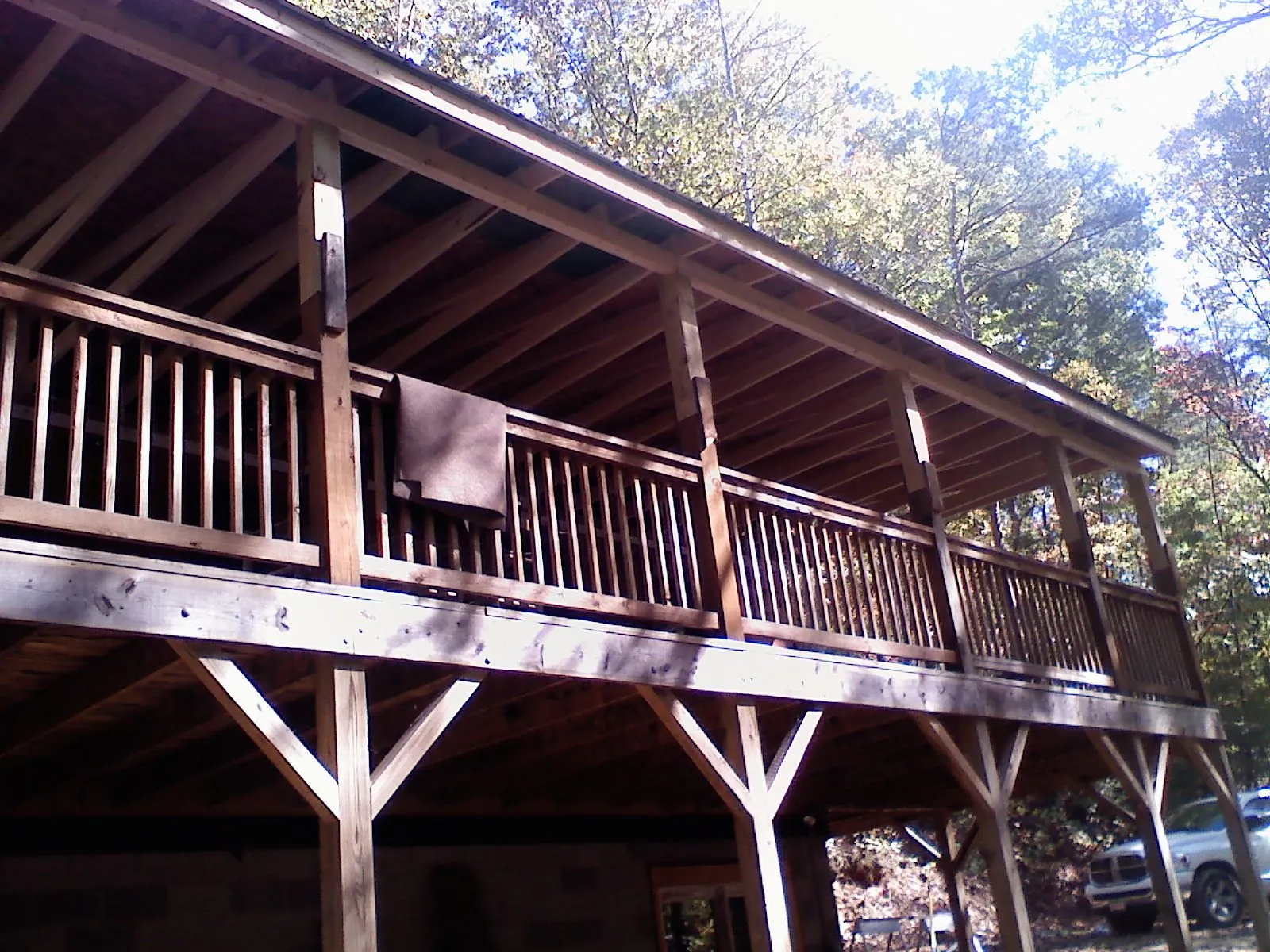 Timber framing under a new elevated porch and deck — Roof Leak Repair in La Harpe by Roofing Brothers